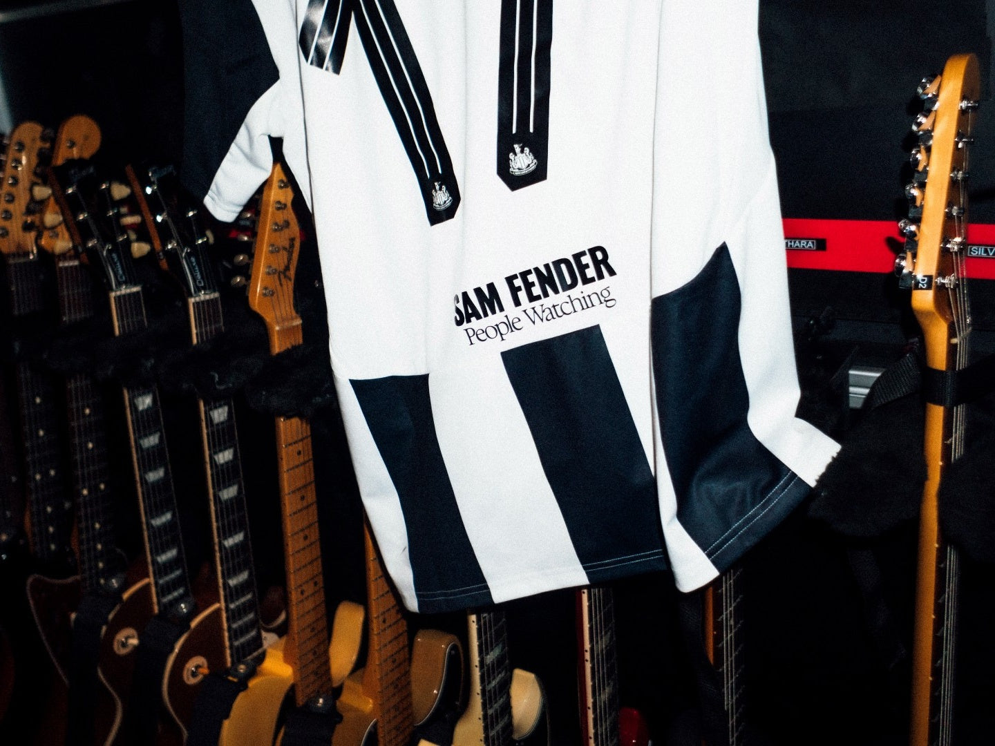 Sam Fender People Watching Back Sponsor for Newcastle 24/25 Home Shirt